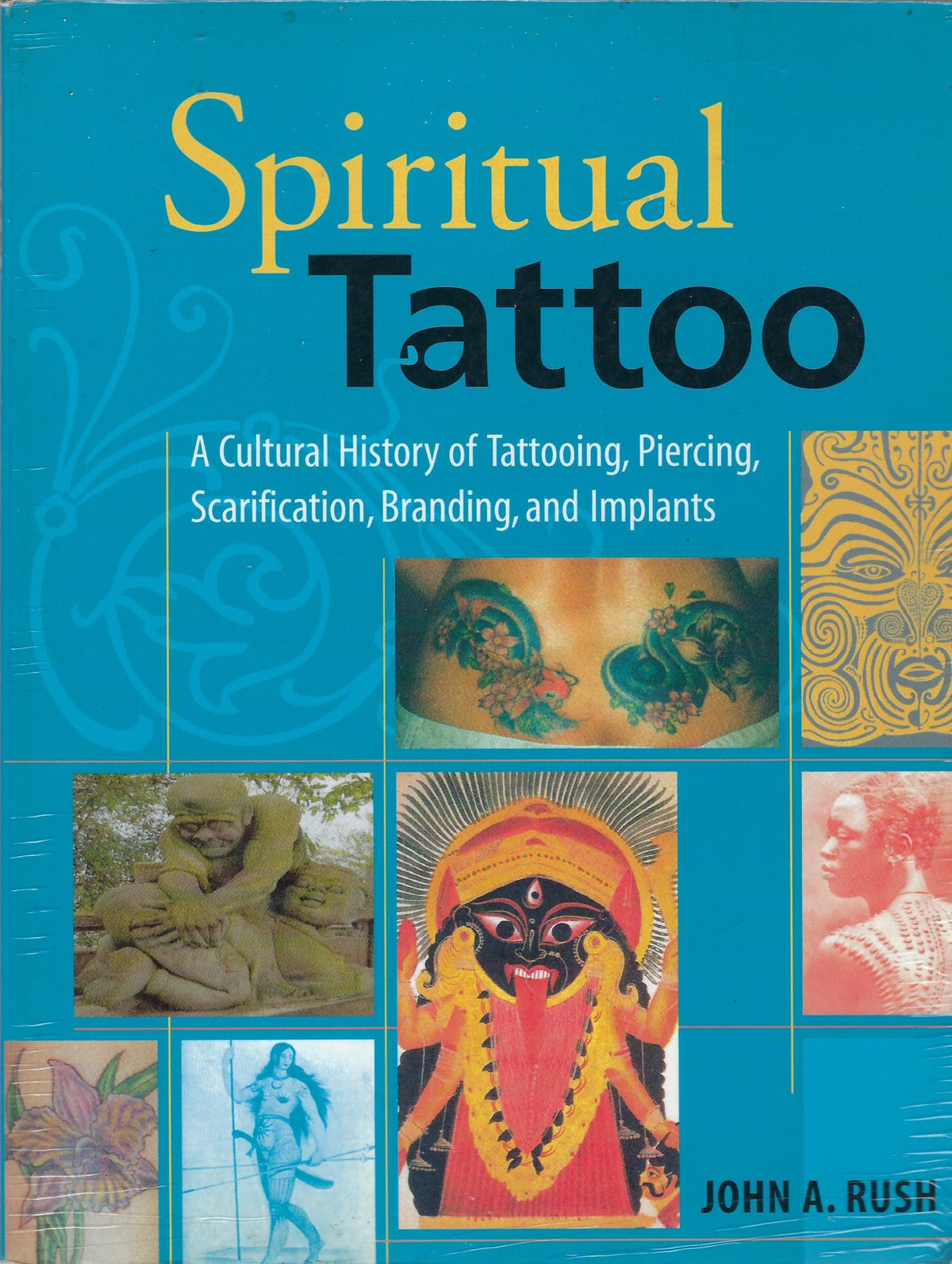 Omslag van Spiritual Tattoo, tweedehands boek bij Boekhandel Bloks