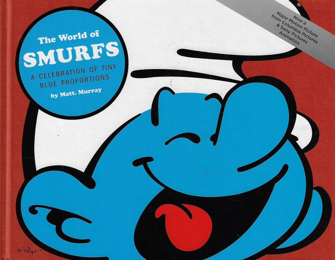Omslag van The World of Smurfs / A Celebration of Tiny Blue Proportions, tweedehands boek bij Boekhandel Bloks