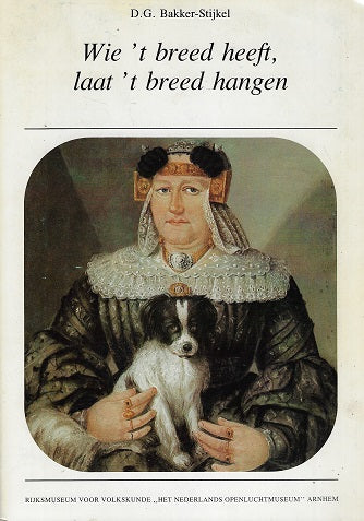 Omslag van Wie t breed heeft laat t breed hangen, tweedehands boek bij Boekhandel Bloks