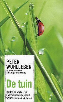Omslag van De tuin / Ontdek de verborgen boodschappen van wind, wolken, planten en dieren, tweedehands boek bij Boekhandel Bloks